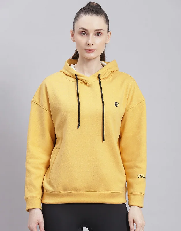 Women Yellow Solid Hooded Full Sleeve Sweatshirt Hoodie with Front Slit Layering Stylish